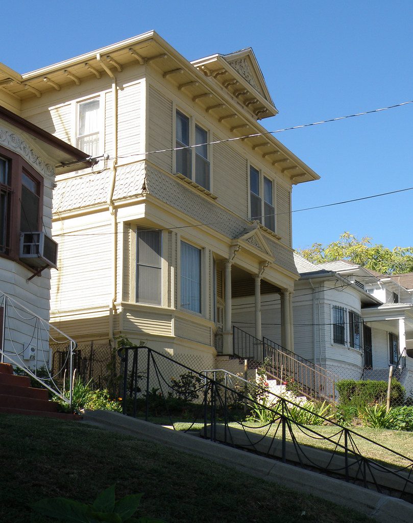 A two-storey Victorian-era home on a sloping Northern California street