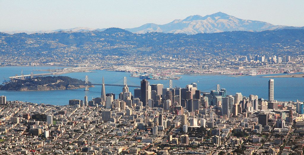 San Francisco and the bay seen from above, with the East Bay hills in the distance